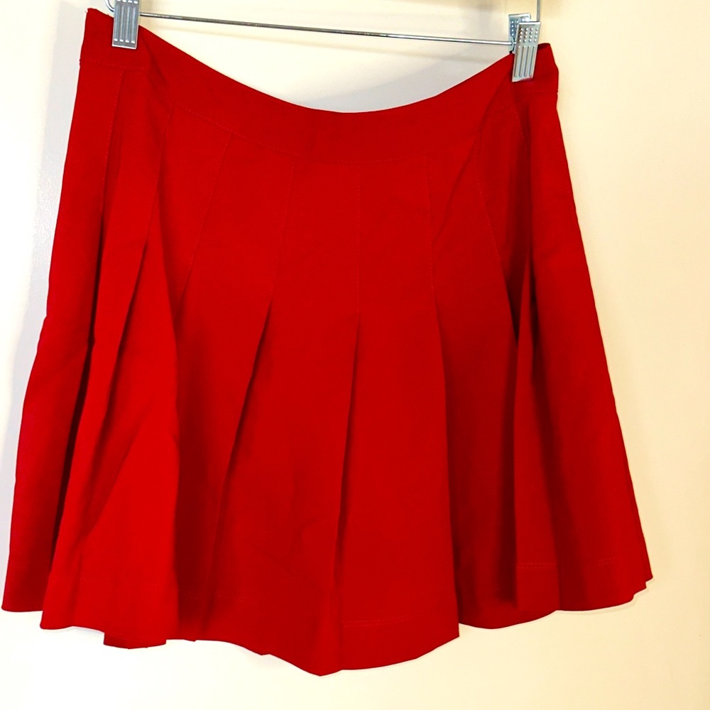 Red mini pleated skirt